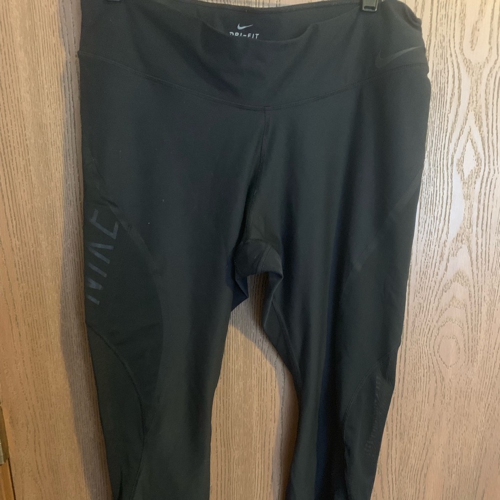 Black Nike leggings with mesh on the sides